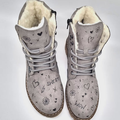 Tattooed women's ankle boots with custom pattern